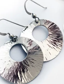 Circular textured silver earrings