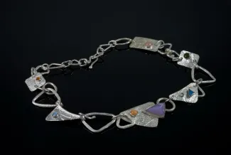 Silver chain with multiple stones