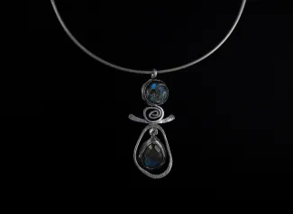 Silver pendant with blue stones