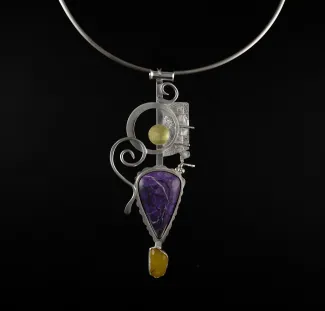 Silver pendant with large purple stone