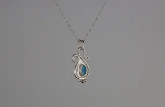 Silver pendant with opal