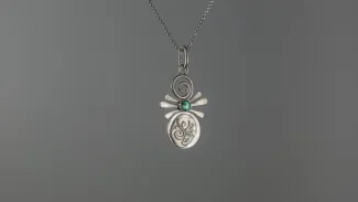 Silver pendant with turquoise stone