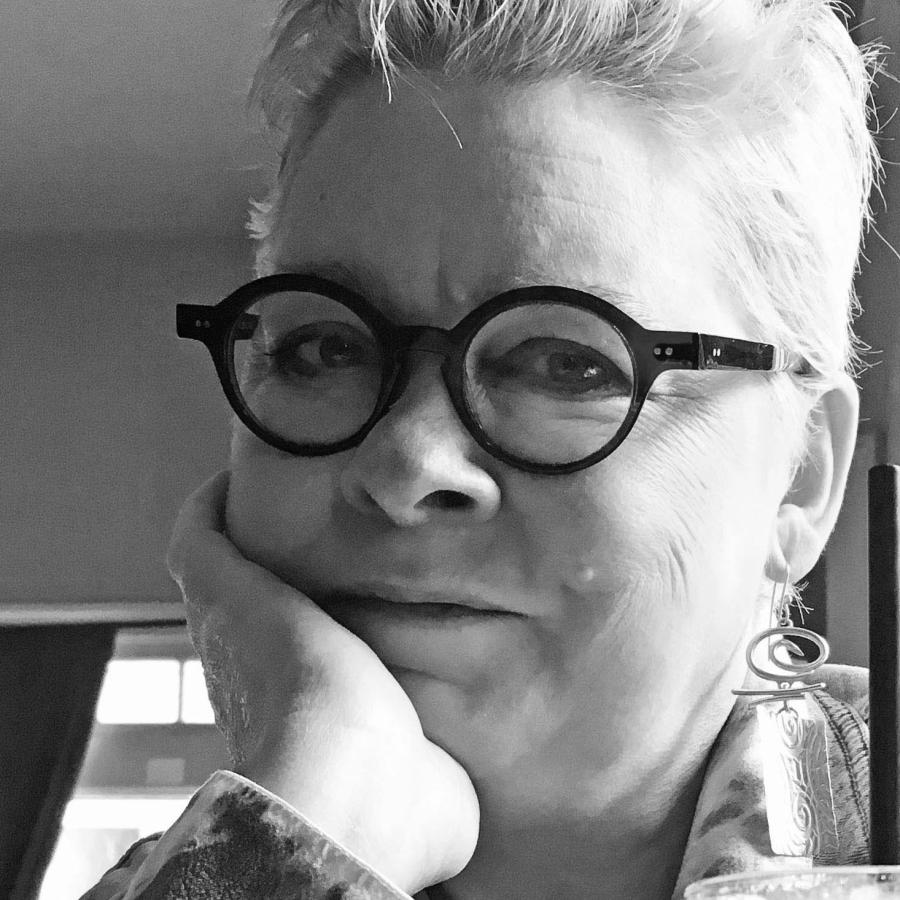 Picture of a woman wearing glasses