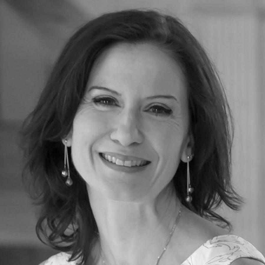 Photo of a woman in a white dress