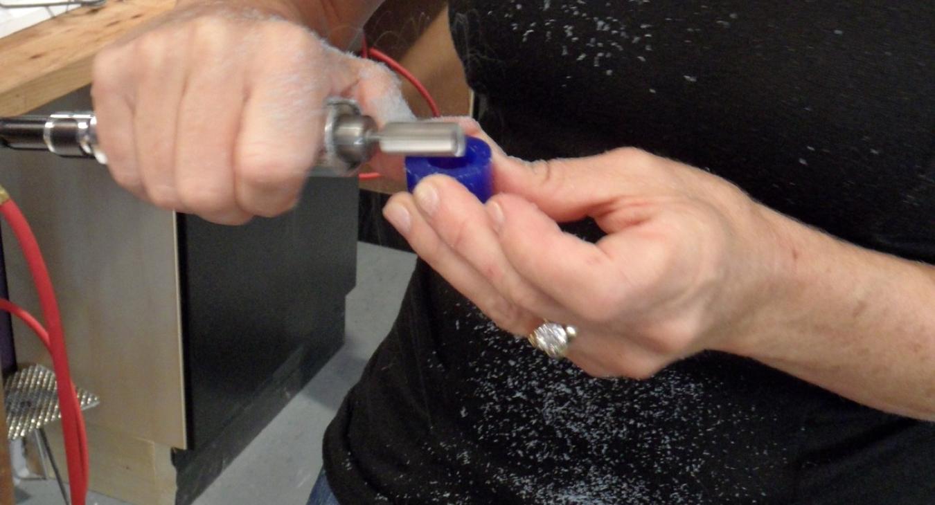 Grinding wax with a flexishaft