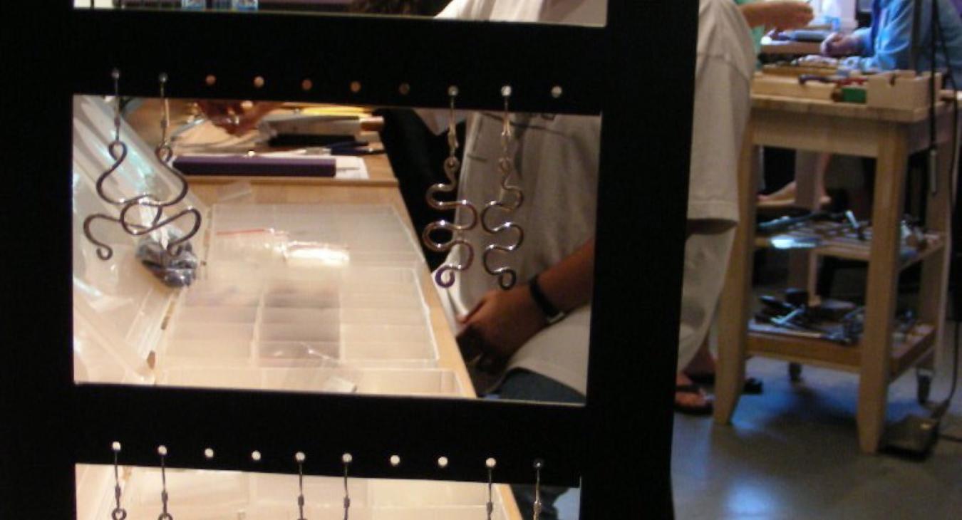 A display of silver earrings