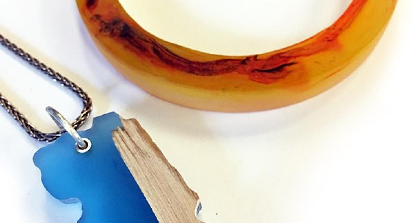 orange resin ring and blue resin square pendant