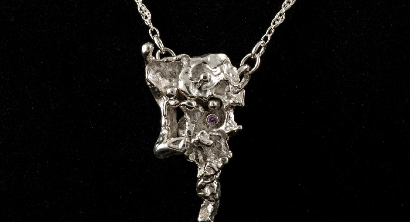 cast silver pendants with