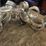 pile of various textured silver spinner rings