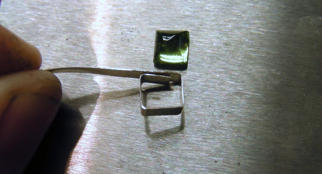 Forming the square bezels for the peridot