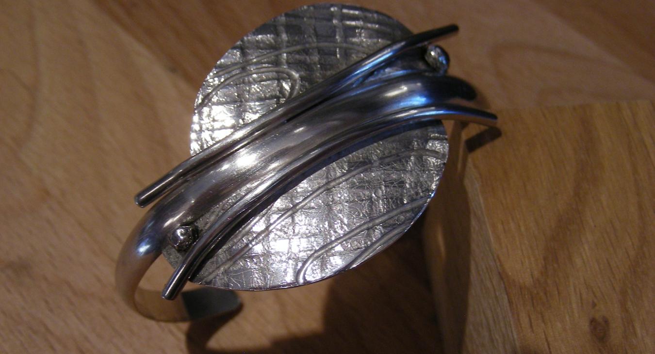 Textured silver and wire cuff