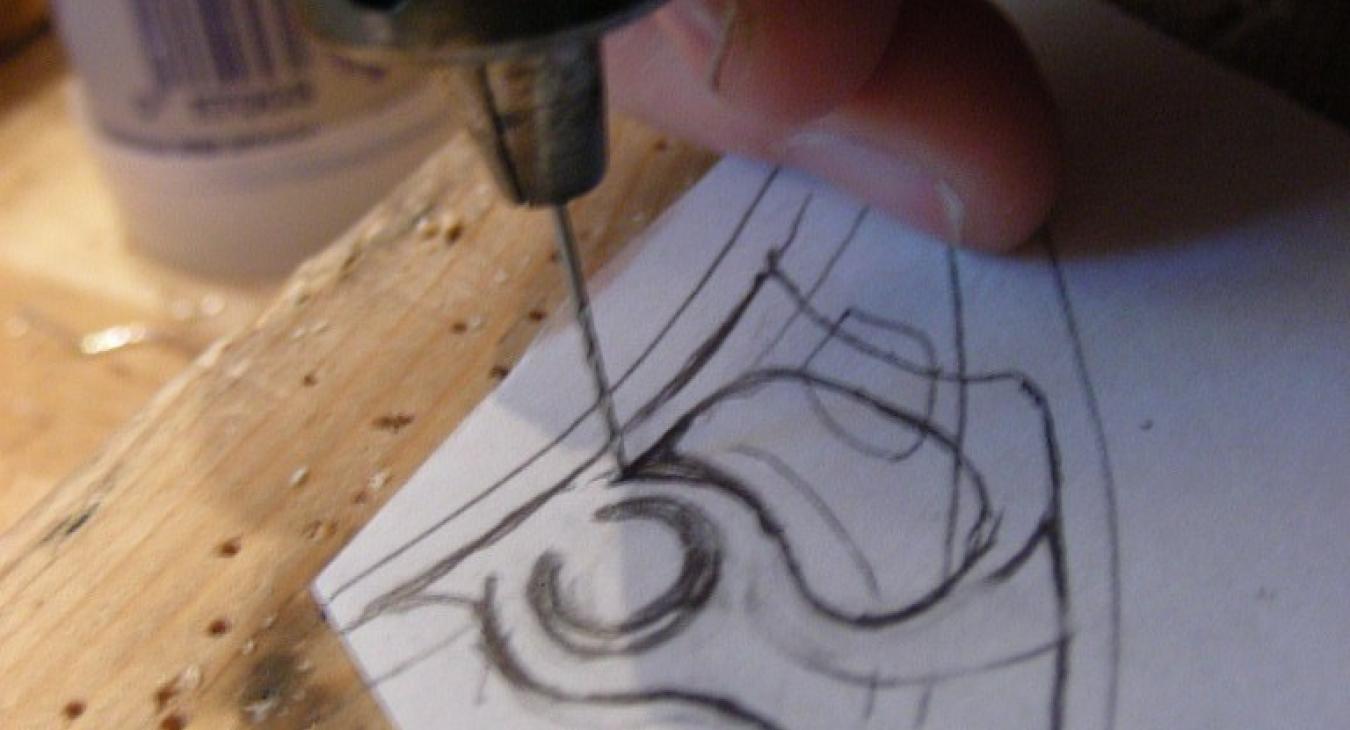Drilling the hole for the saw blade.