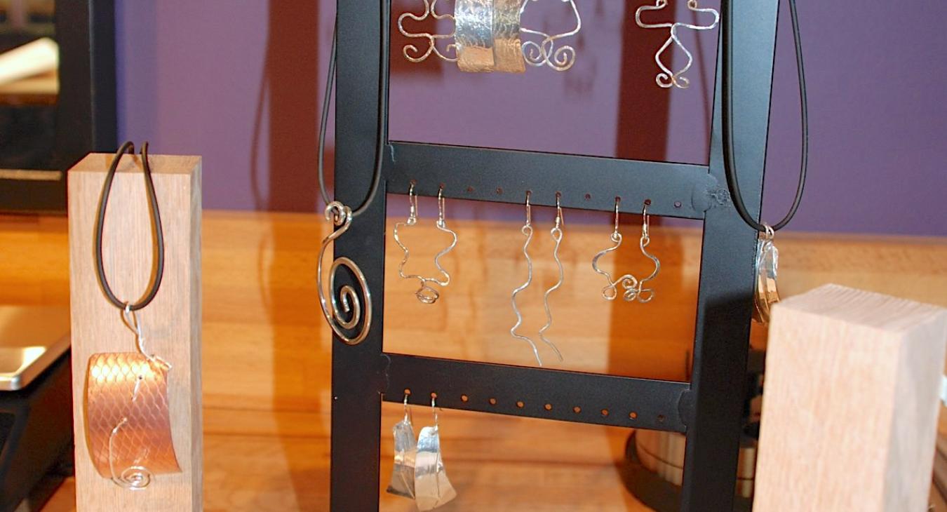 Student earrings on a rack