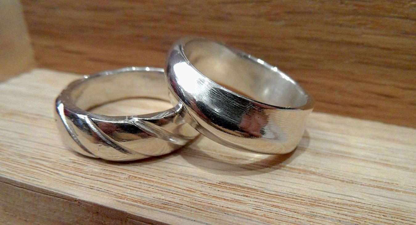 Two cast silver rings