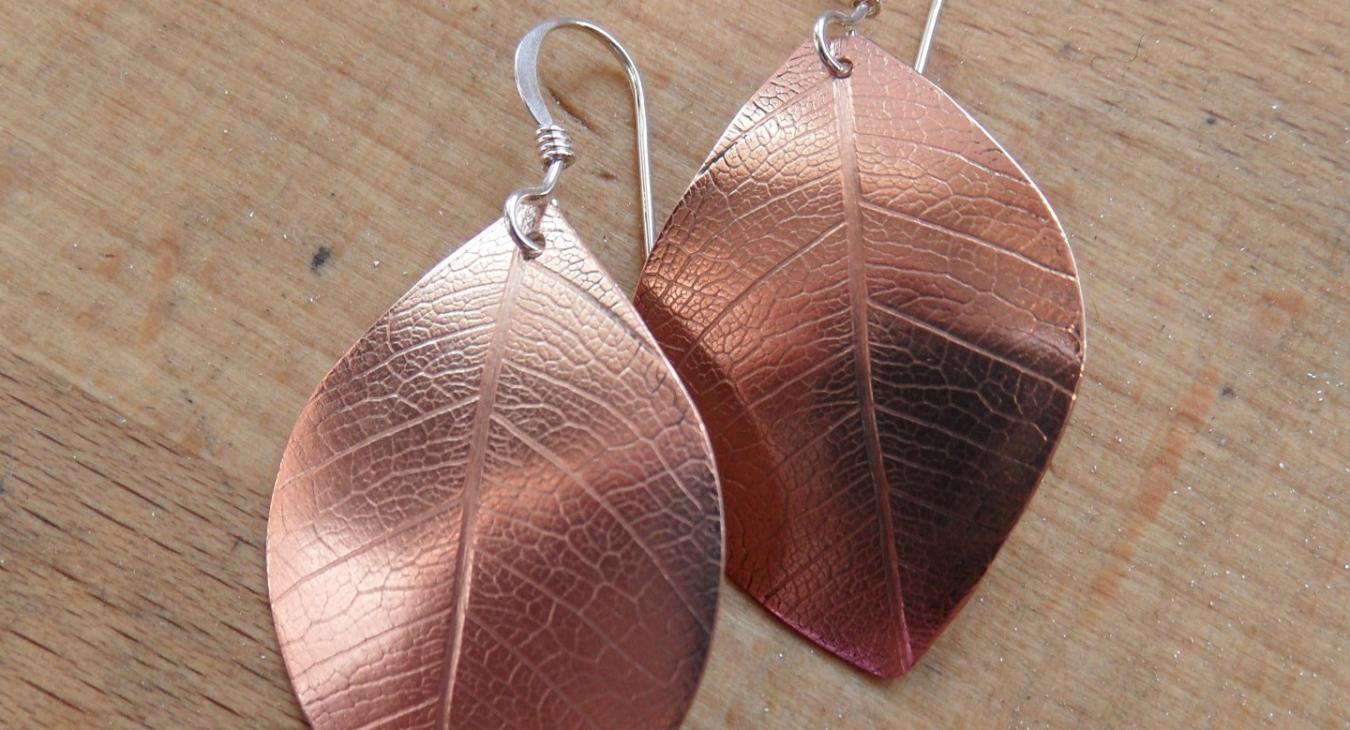 Leaf-textured imprint earrings by Kathleen