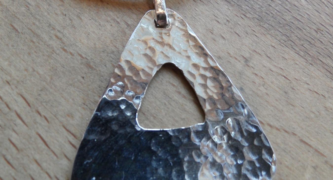 Hammered triangle pendant by Zafer