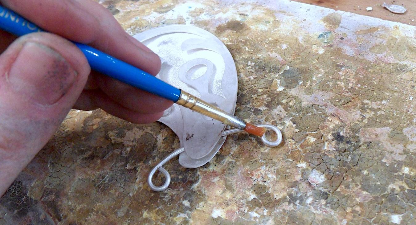 Staging the beginning of the chain for soldering