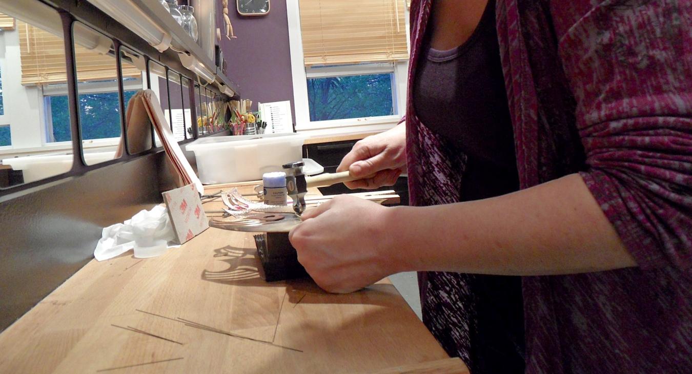 Blair shaping the piece as texture is applied