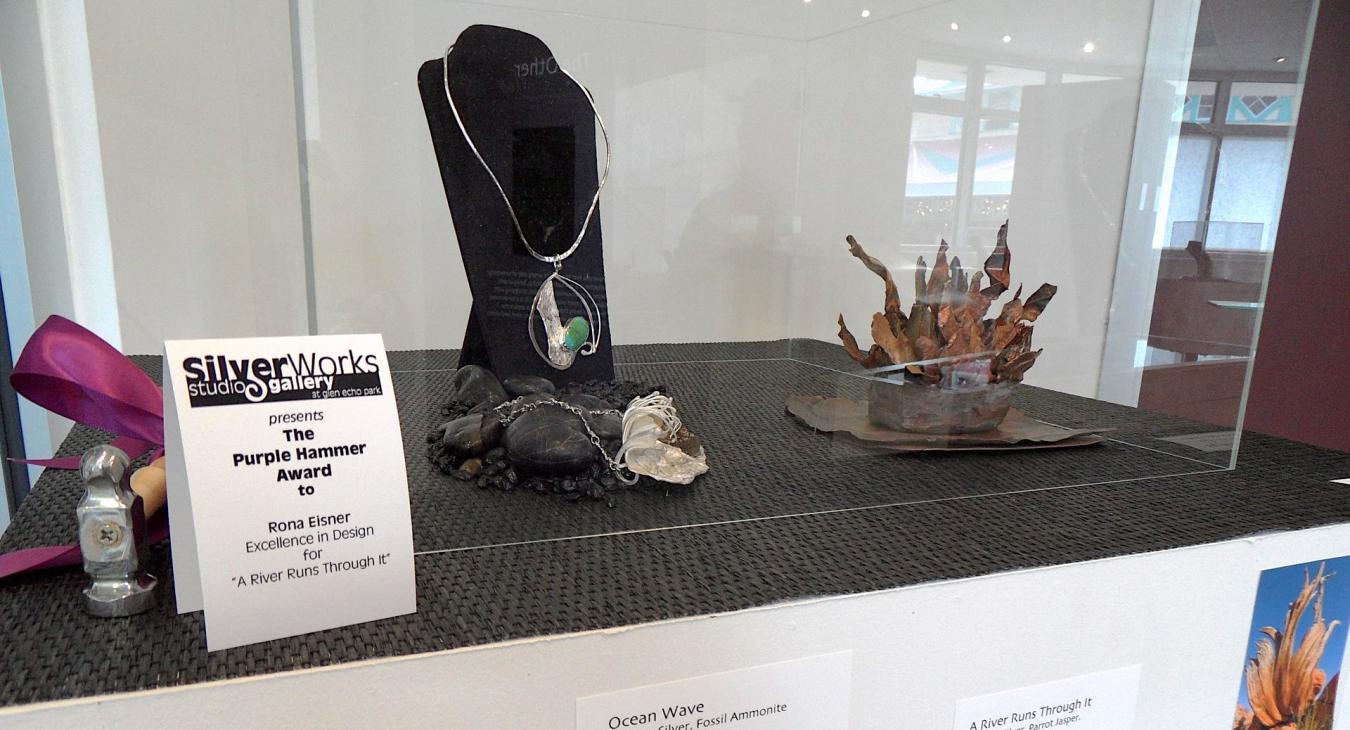 A collection of work by Rona Eisner on display