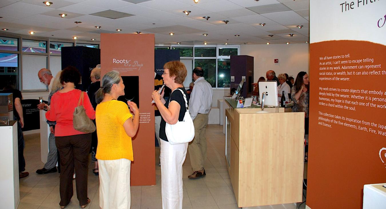 Patrons enjoying the show opening
