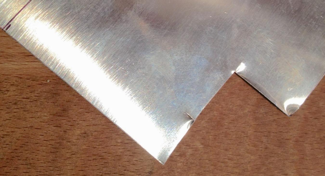Silver sheet cut incorrectly with hand shears