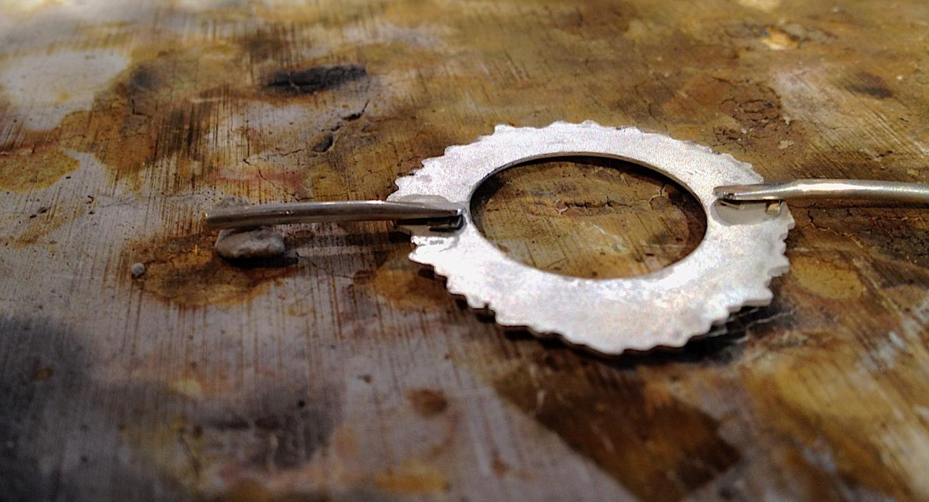 Staging the coin holder component for soldering