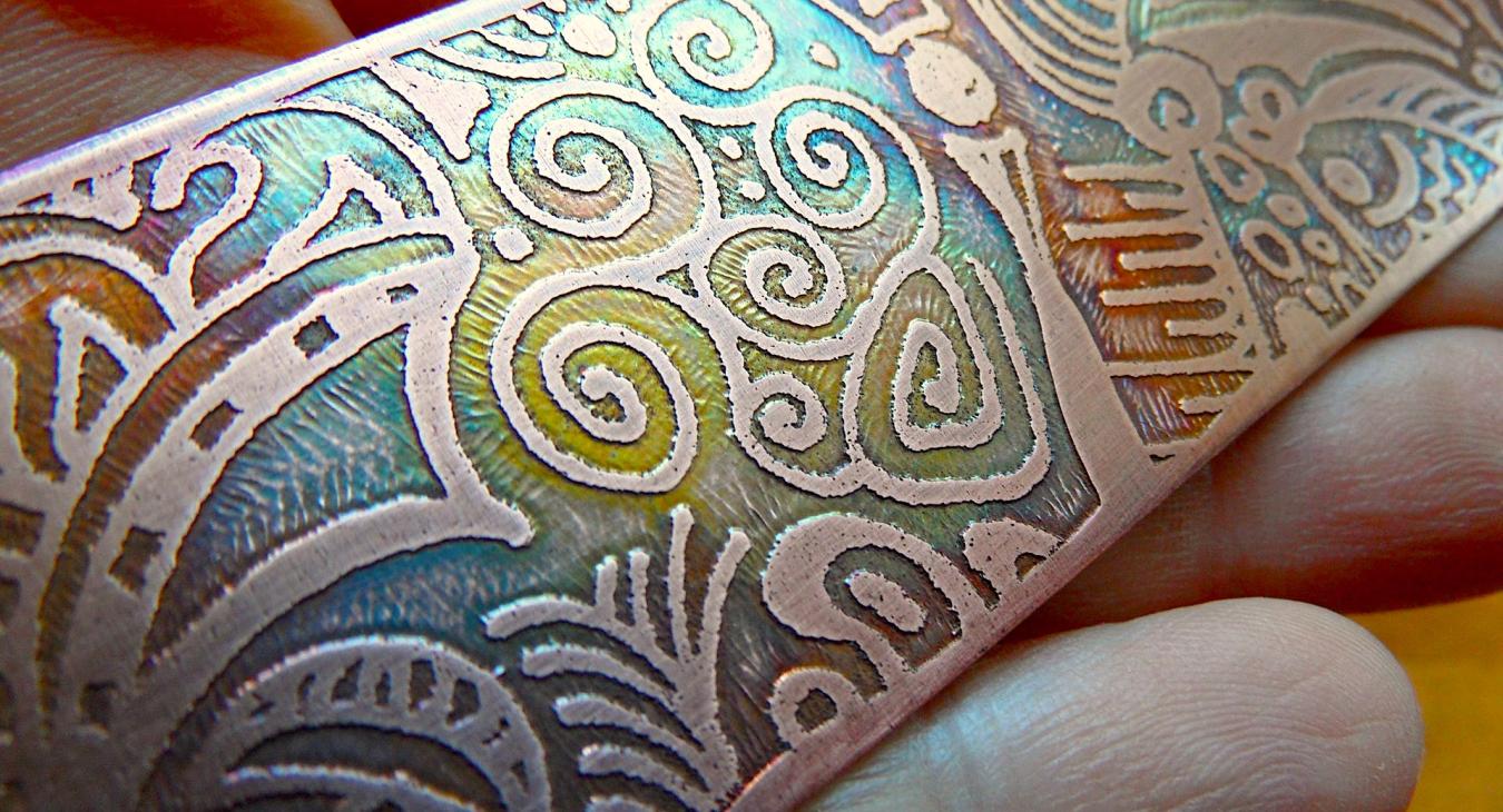 Copper sheet etched, with multi-colored patina, ready for forming