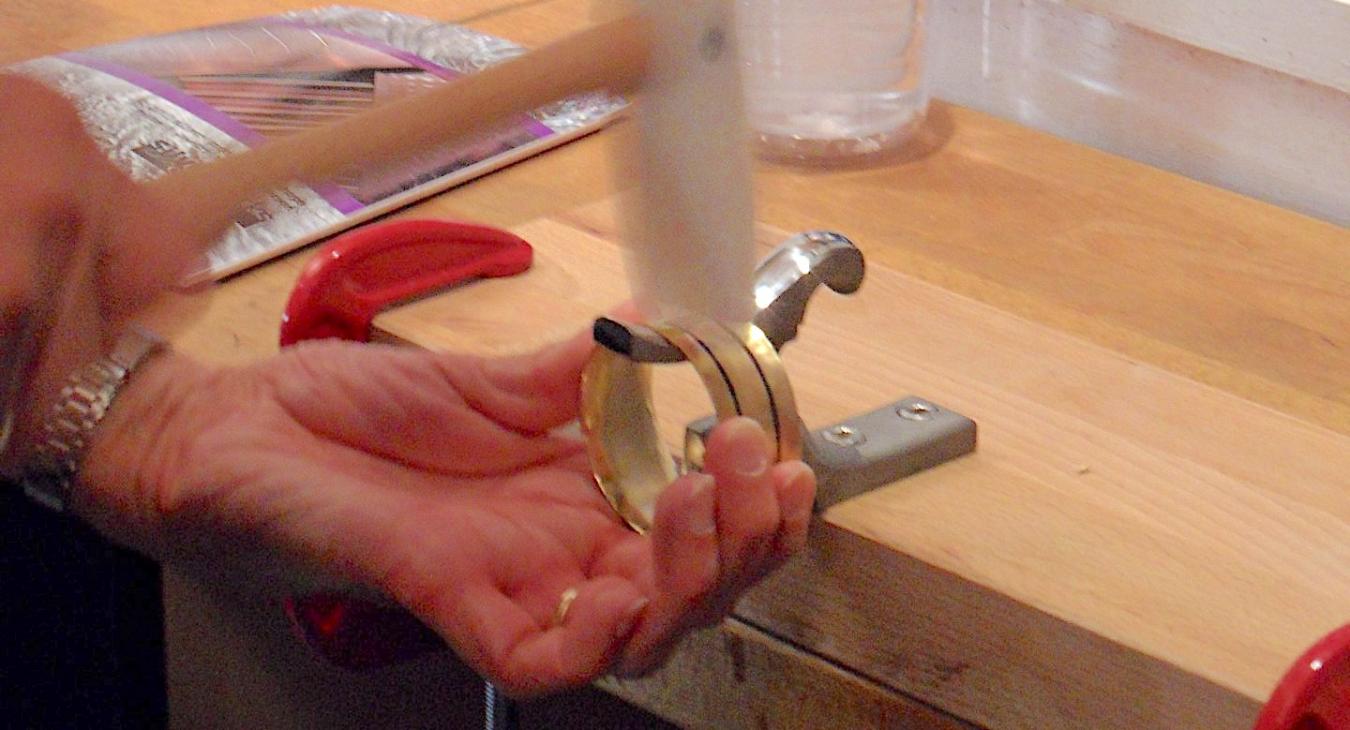 Ring blank on the stake marked in thirds.