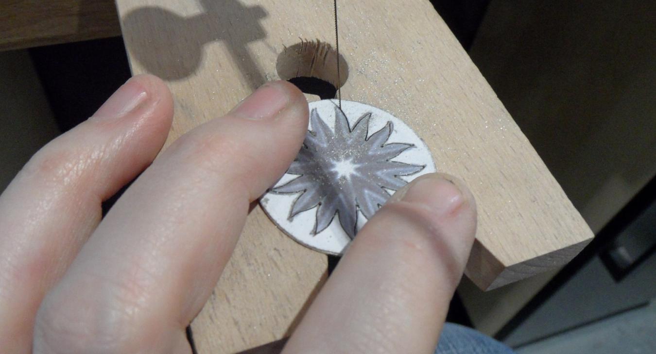 Sawing out the logo