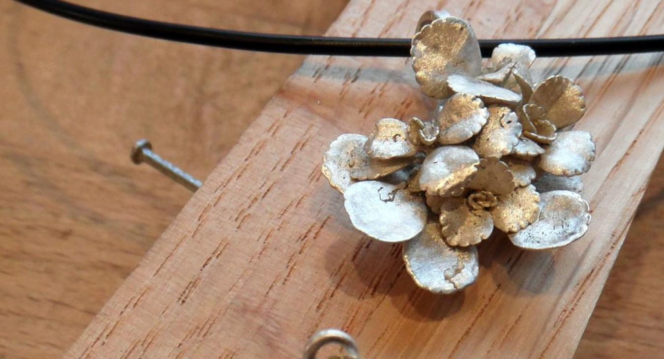 Kristi's pendant and earrings made from a succulent burned out directly