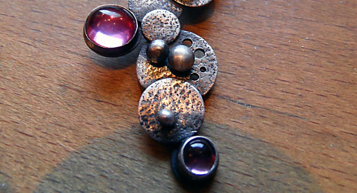 Bubbles pendant with silver discs, balls and pink gems