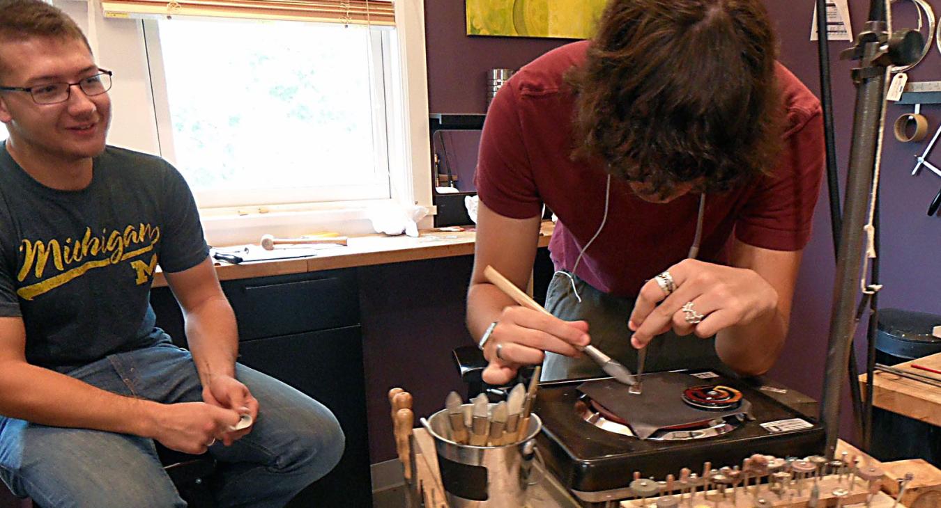 David burnishing while Danny watches
