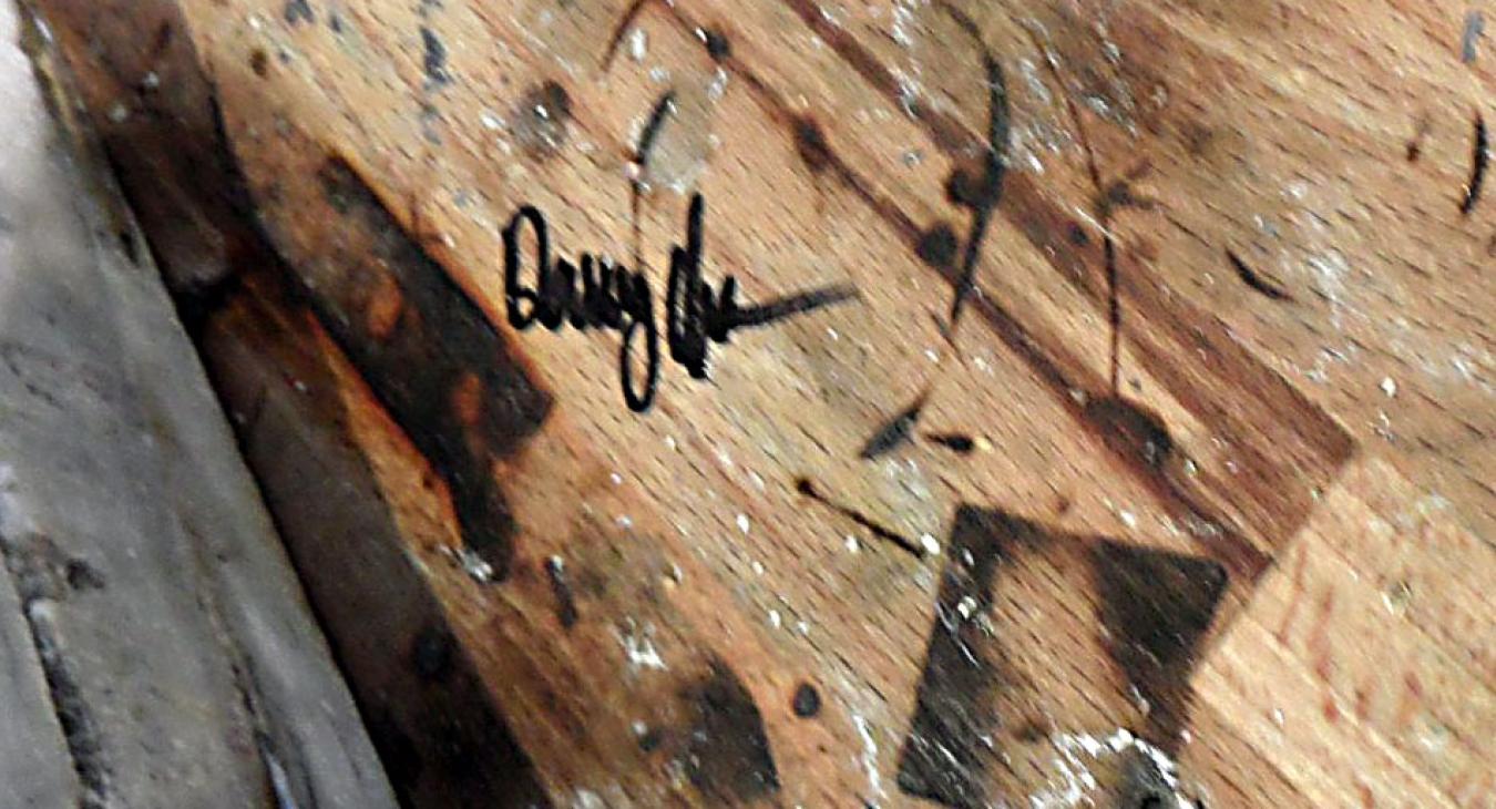 Burn mark on bench with Danny's signature