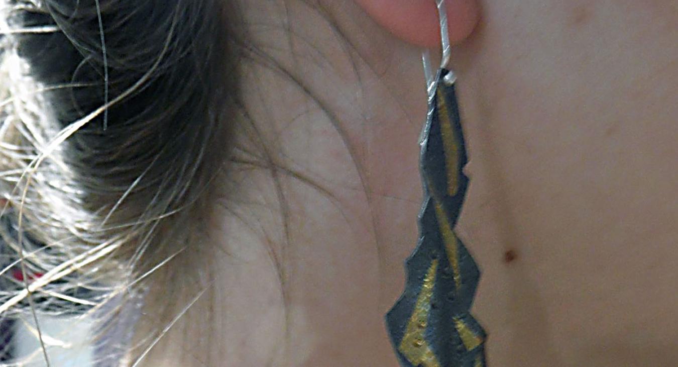 Kaila wearing her keum boo earrings 