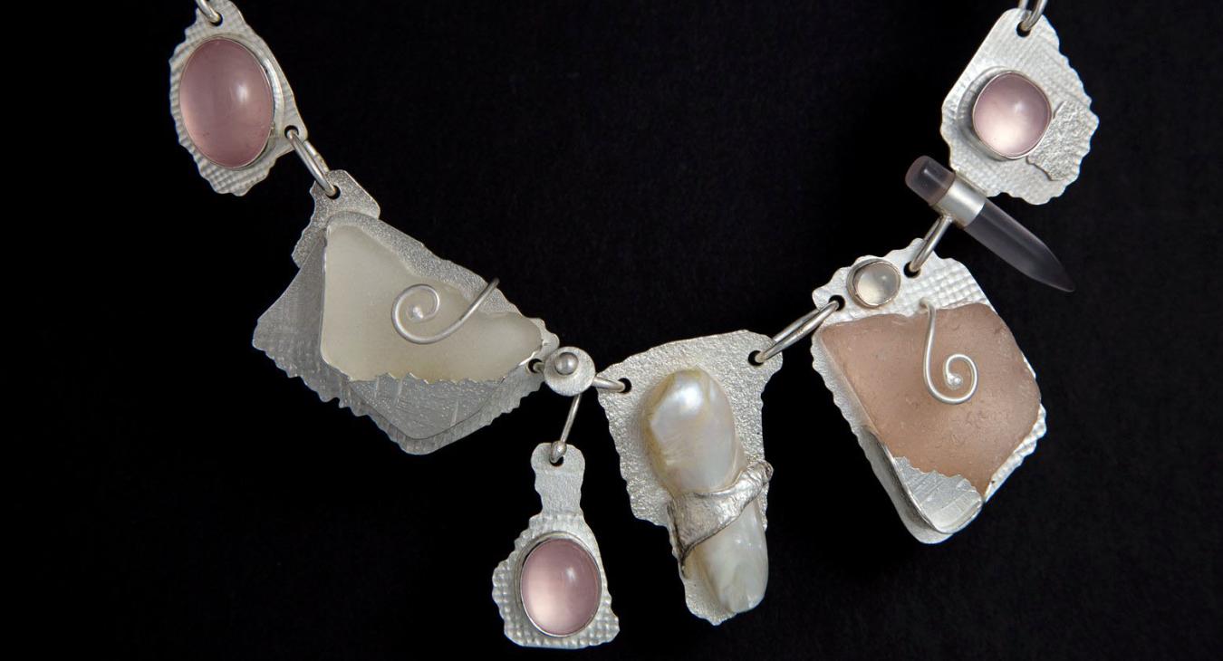 Necklace with various linked sterling silver pieces, with beach glass, rose quartz and pearl