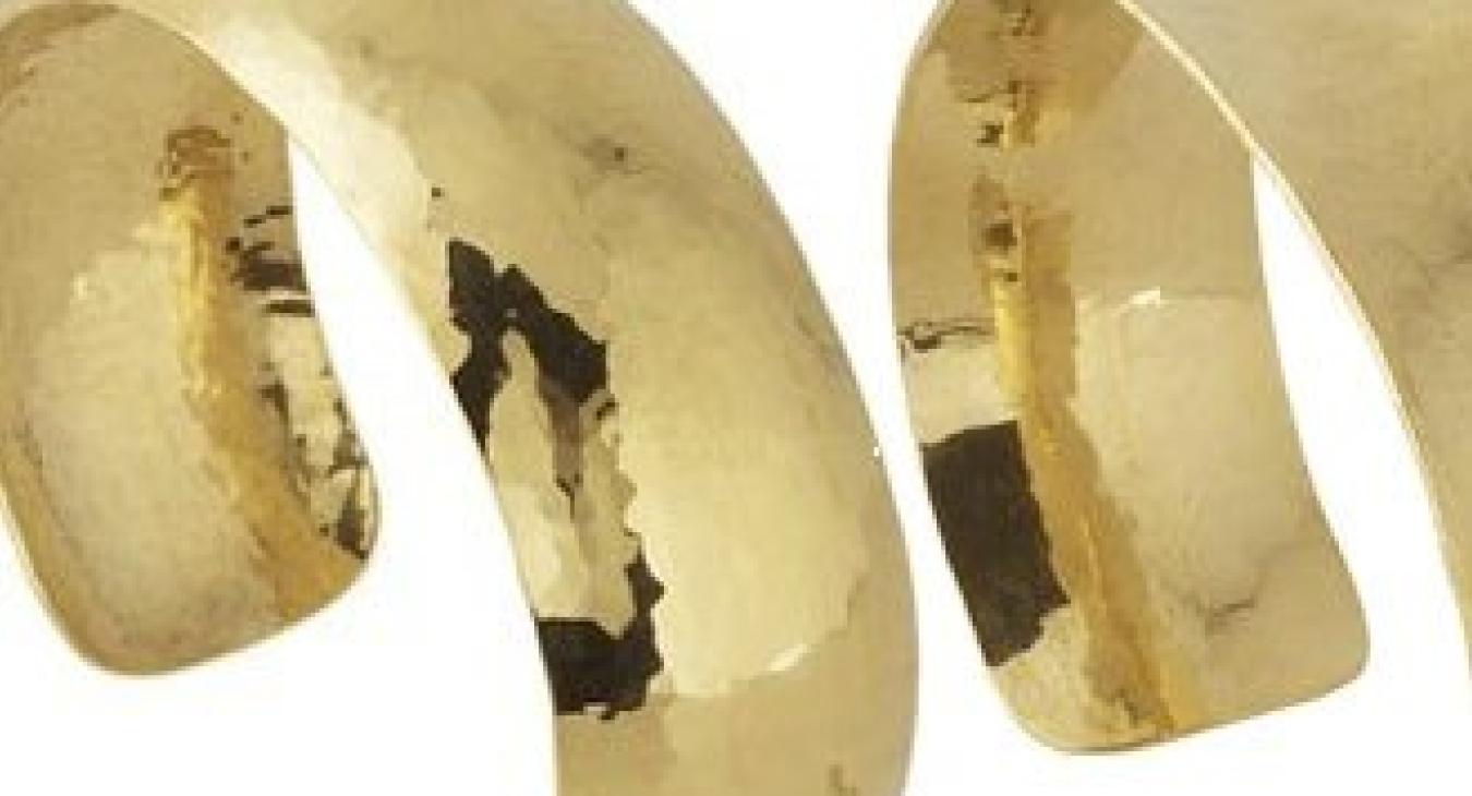 Gold-colored, formed cuff bracelets