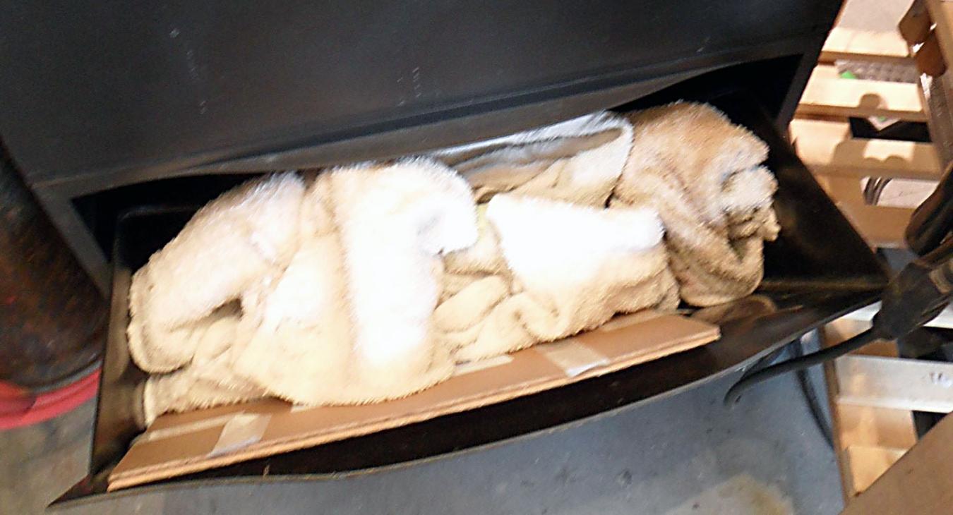 drawer labeled clean above separate drawer for dirty towels