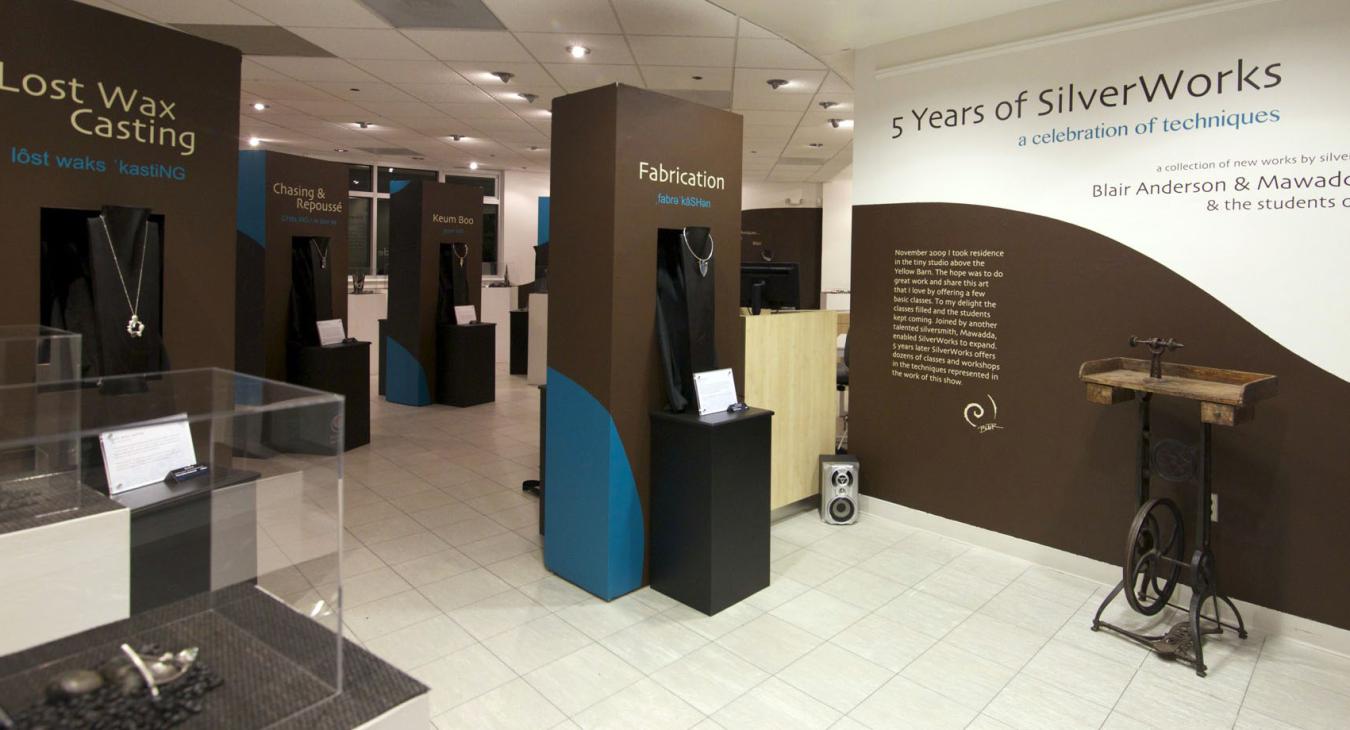 image of show with different display towers and title description