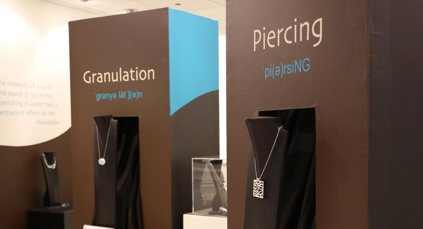 display towers showing pendants with piercing and granulation techniques