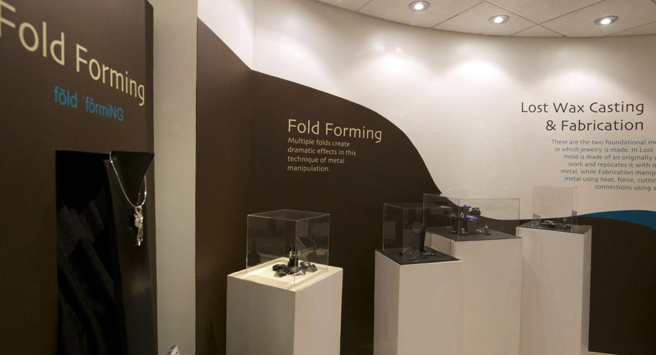 display cases for fold forming and casting pieces