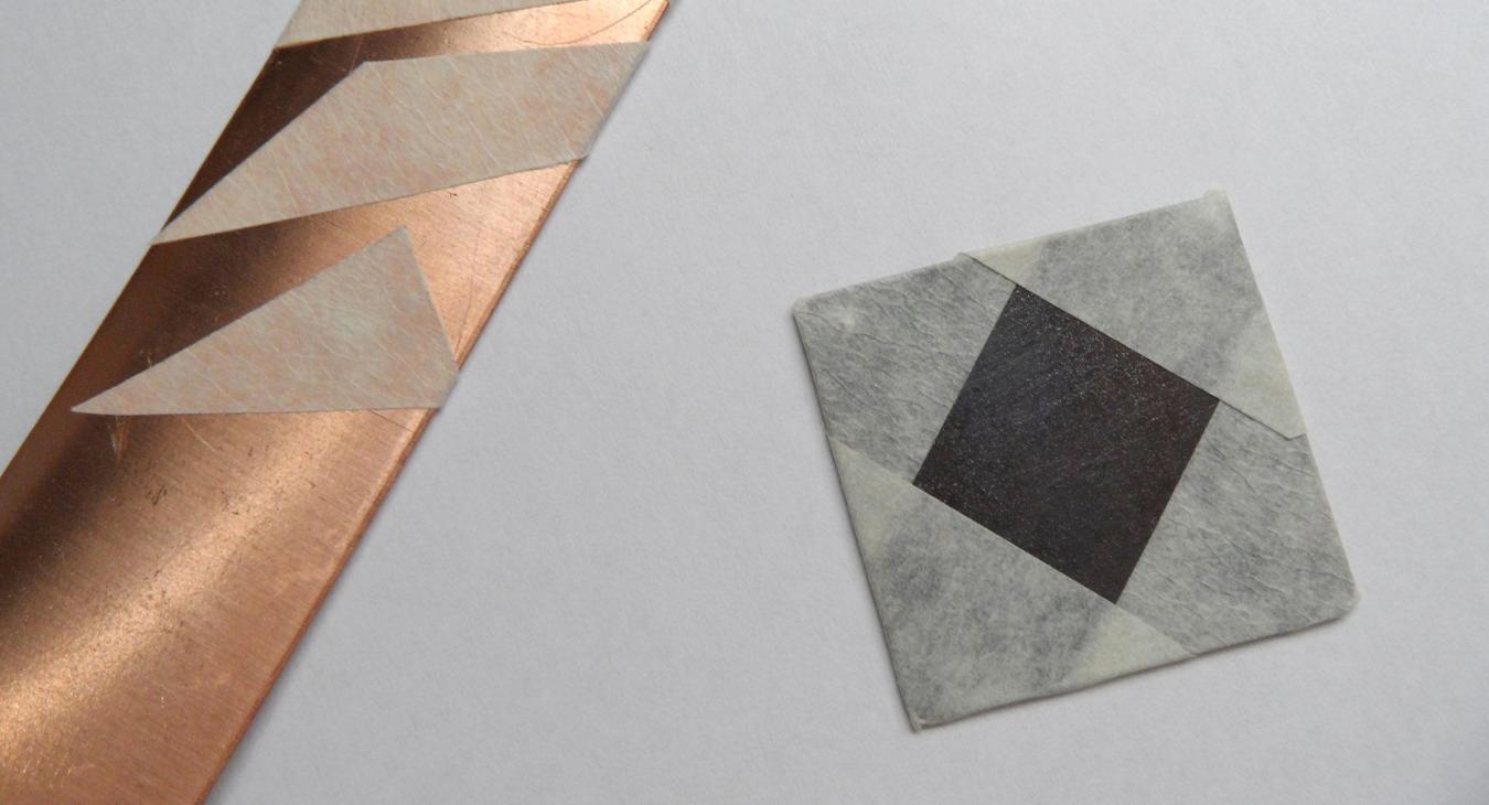 sand blasted copper and silver with parts taped to retain shine