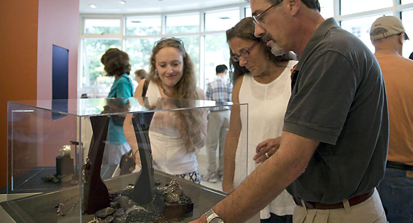 Guests looking at displayed work