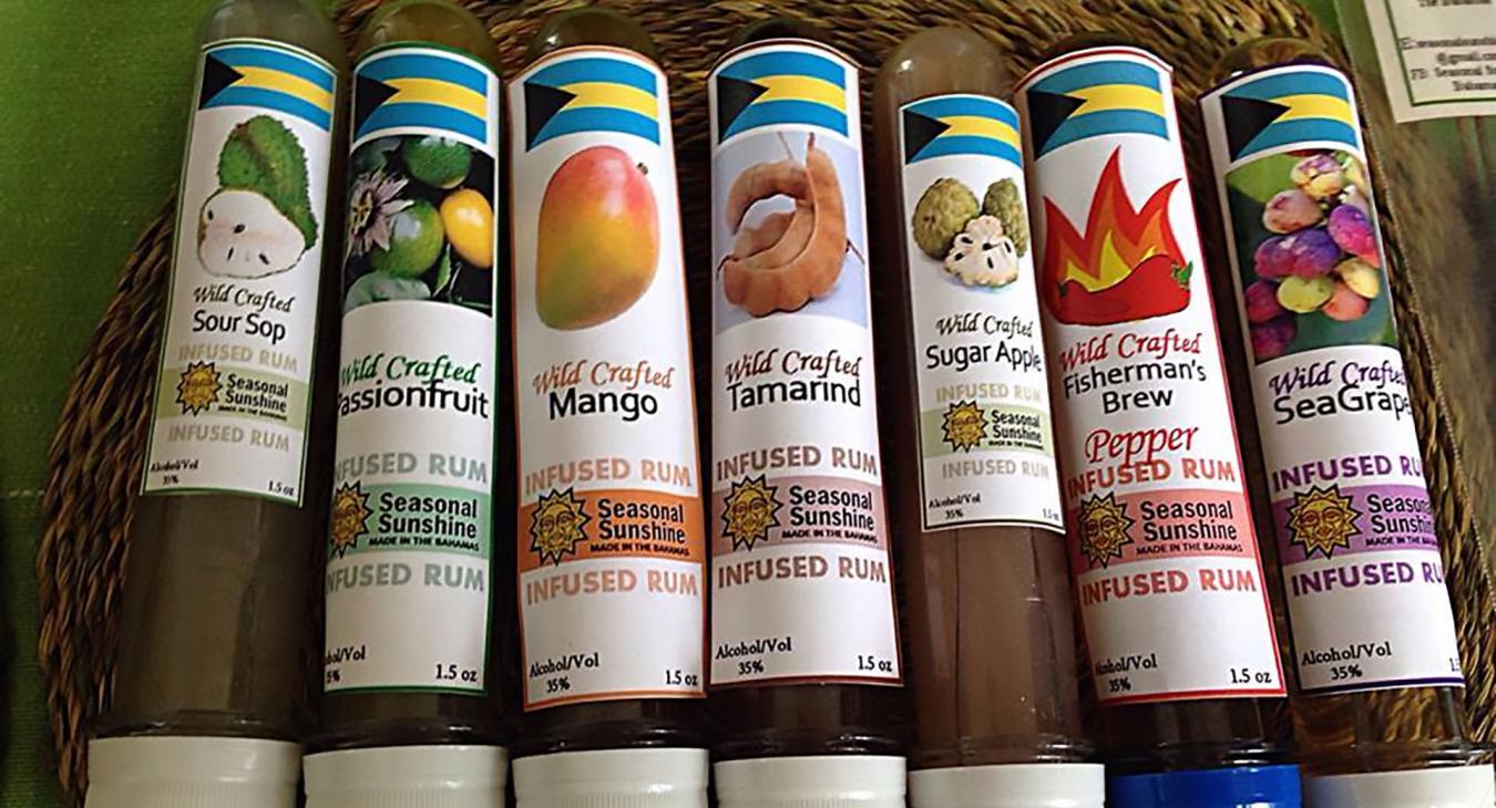 bottles of various fruit rum infusions