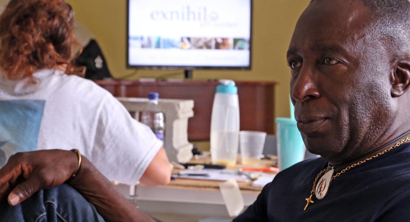 tyrone ferguson sitting at the workshop