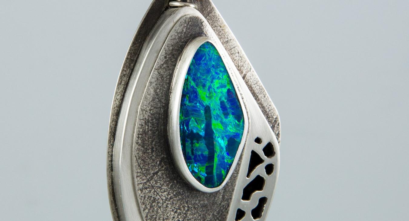 finished silver pendant with black opal