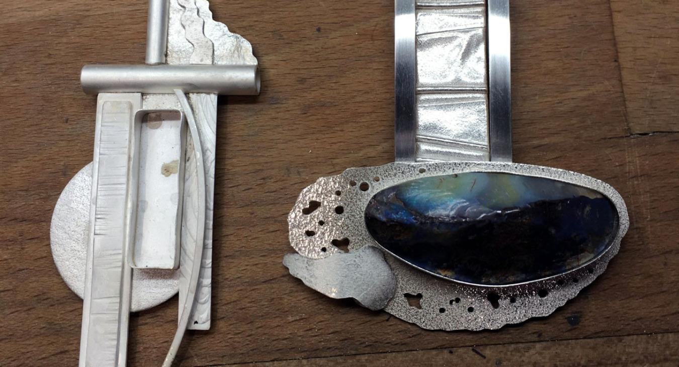 two unfinished pendants 