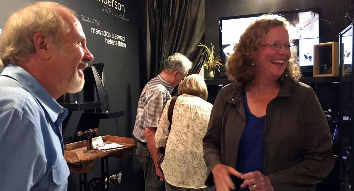 alan and peg smiling at opening