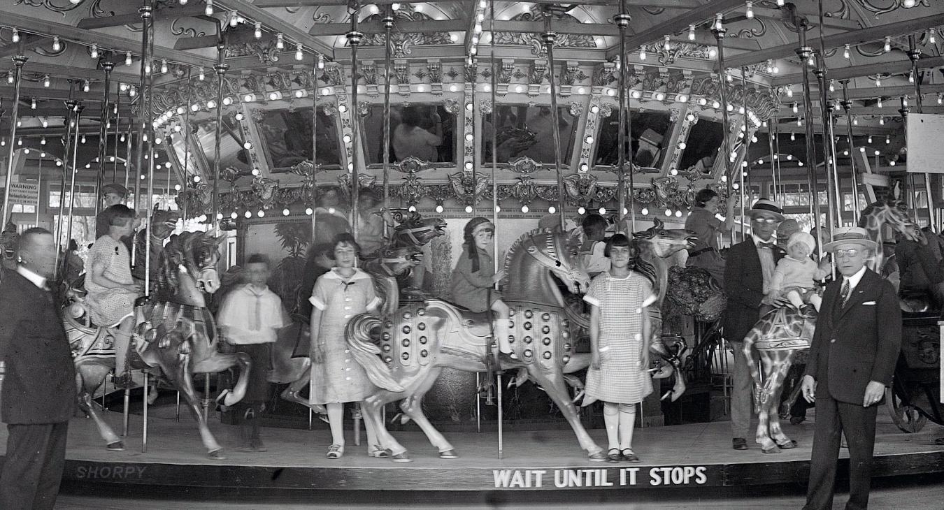 black and white photo of carousel