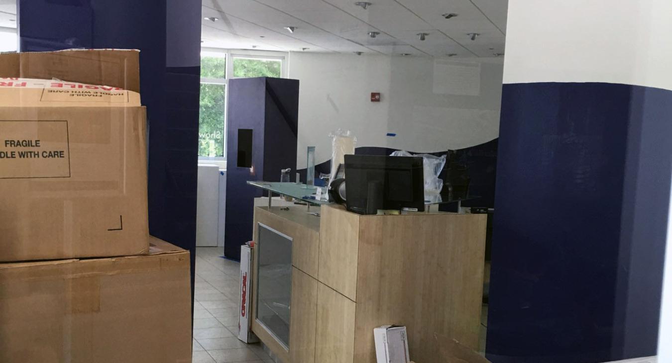 boxes stacked in gallery space