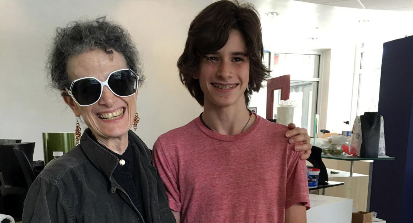 Ruth in sunglasses posing with Louis